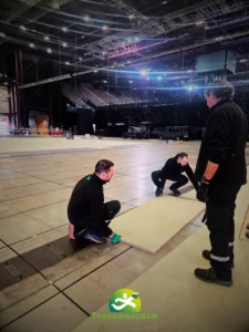 Manutention lourde en logistique evenementielle montpellier pour l Open Occitanie, intervention des equipes Transmanudem a la Sud de France Arena.